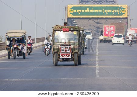 Mandalay, Myanmar - Feb 18,2018 : Vehicle Traffic On The Irrawaddy Bridge (yadanabon Or Ayeyarwady B