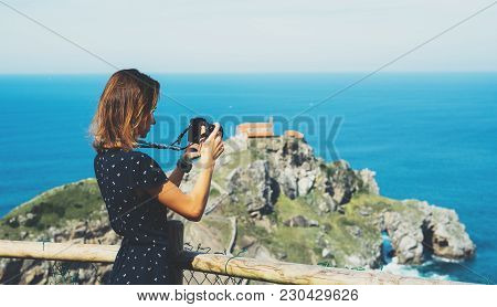 Tourist Traveler Photographer Making Pictures Sea Scape On Photo Camera On Background Ocean Gaztelug