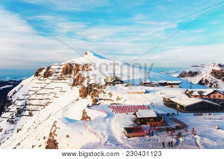 Mannlichen Mountain And Resort With Tourists In Winter Swiss Alps