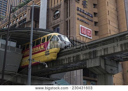Kuala Lumpur, Malaysia - December 31,2017 : Kl Monorail Train Passing Through Berjaya Times Square S