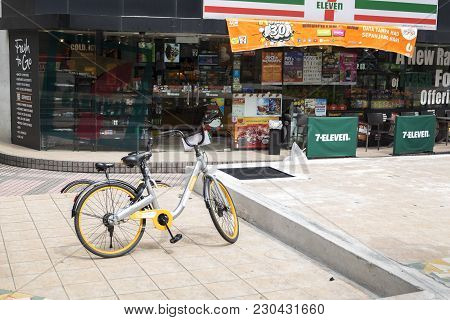 Kuala Lumpur, Malaysia,31 Dec 2017: View Of Shared Obike Bicycles In Front 7 Eleven Outlet Store