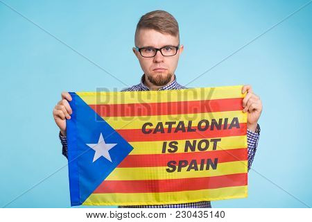 Man With Pro-independence Flag. Referendum For The Separation Of Catalonia From Spain Concept.