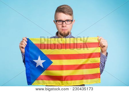 Man With Pro-independence Flag. Referendum For The Separation Of Catalonia From Spain Concept.