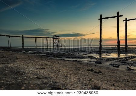Surface Lavel And Selective Shot, Stunning Sunset Seascape With Abandone Structure
