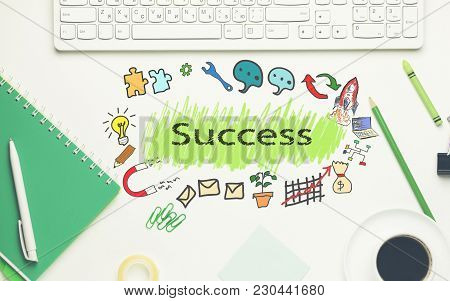 Seccess Text With Computer Keyboard And  Stationary
