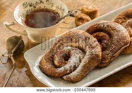 Teaparty With Zeeuwse Bolus On The Whitw Plate And Table Of Wooden Background.