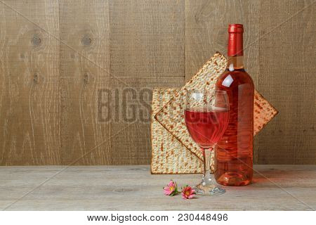 Jewish Holiday Passover Background With Wine And Matzo