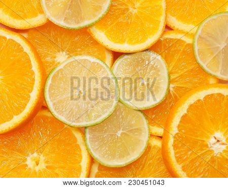 Fresh Citrus, Orange And Lime. Closeup Isolated