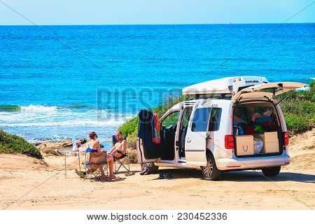 Arbus, Italy - September 13, 2017: People Relaxing At Their Car At Capo Pecora Resort In The Mediter