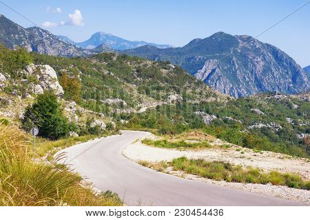 Summer Mountain Landscape With A Winding Country Road.  Dinaric Alps, Montenegro