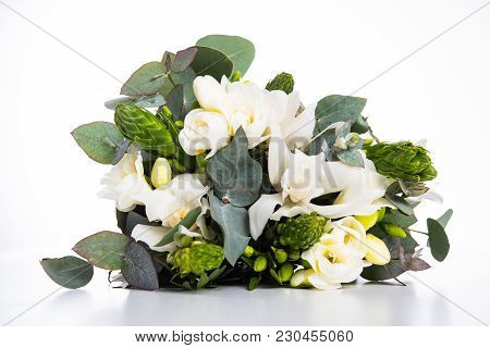 Sophisticated Bridal Bouquet Of Flowers, White Freesias And Orchids On A White Background Isolated