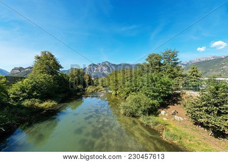 The Sarca River (fiume Sarca) And Italian Alps Near Arco Di Trento. Trentino Alto Adige, Italy, Euro