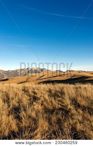 Alpine Foothills (prealps) And The Plateau Of Lessinia. In The Background The Small Dolomites (careg