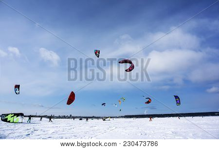 Perm, Russia - March 09, 2018: Snowkiters Rides On The Ice Of The Kama Reservoir