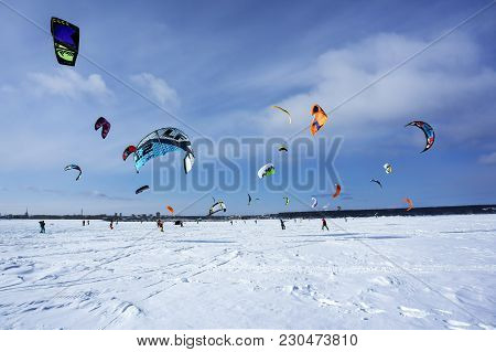 Perm, Russia - March 09, 2018: Snowkiters Rides On The Ice Of The Kama Reservoir