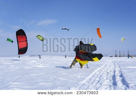 Perm, Russia - March 09, 2018: Snowkiters Rides On The Ice Of The Kama Reservoir