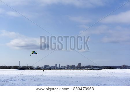 Perm, Russia - March 09, 2018: Snowkiters Rides On The Ice Of The Kama Reservoir