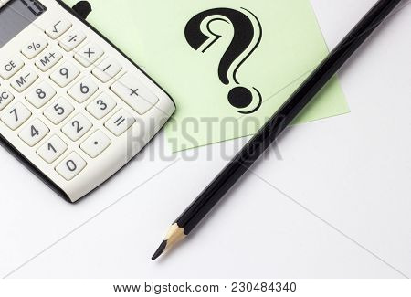 Close Up Of Calculator, Instrument Of Measurement And Pencils
