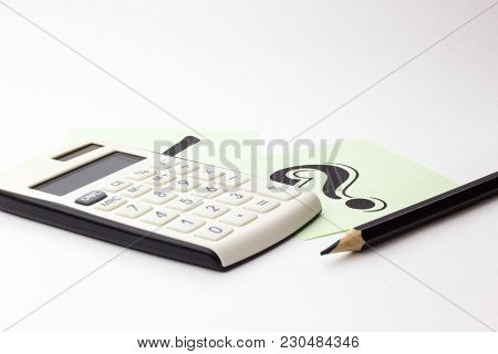 Close Up Of Calculator, Instrument Of Measurement And Pencils