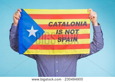 Man With Pro-independence Flag. Referendum For The Separation Of Catalonia From Spain Concept.
