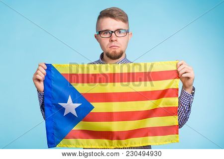 Man With Pro-independence Flag. Referendum For The Separation Of Catalonia From Spain Concept.