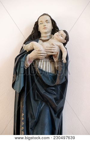 SISAK, CROATIA - DECEMBER 07: Virgin Mary with baby Jesus, statue in the Church of Visitation of the Virgin Mary in Sisak, Croatia, on December 07, 2017.