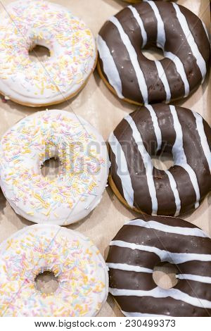 Donut. Sweet Icing Sugar Food. Dessert Colorful Snack. Glazed Sprinkles. Treat From Delicious Pastry