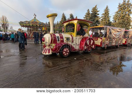 Kiev, Ukraine - February.17, 2018: Children's Rides During The Celebration Maslenitsa In The Park En