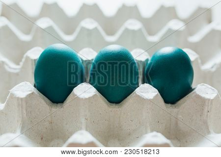 Easter Eggs Of Different Colors In Tray Background