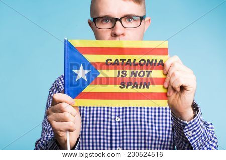 Man With Pro-independence Flag. Referendum For The Separation Of Catalonia From Spain Concept.