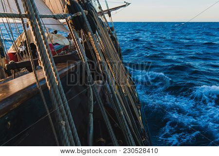 Seascape From The Side Of An Old Wooden Sailboat