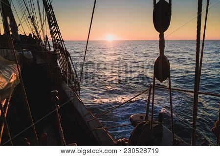 Seascape From The Side Of An Old Wooden Sailboat