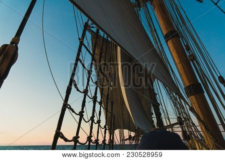 Seascape From The Side Of An Old Wooden Sailboat