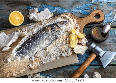 Fish Baked In Salt With Lemon And Oil, Deadpan Style, Rustic, Top View