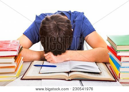 Tired Student Sleep On The Book On The White Background