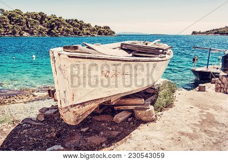Old Fishing Boat With Cracked White Paint, Solta Island, Croatia. Travel Destination. Mediterranean 