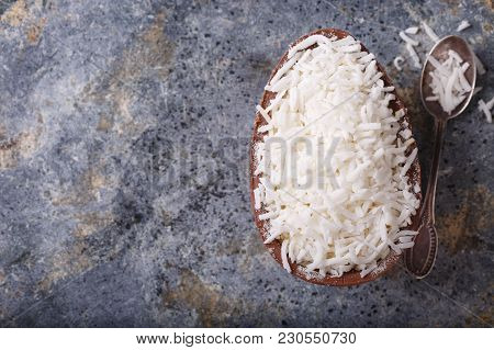 Chocolate Egg With Filling For Easter On Wooden Background