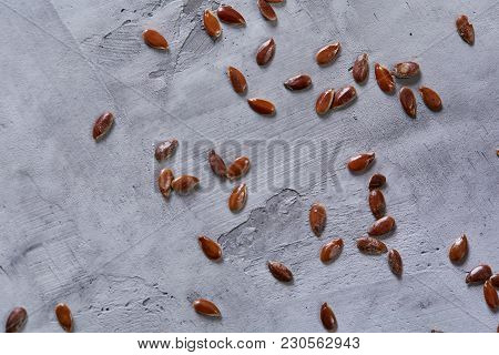 Top View Close-up Picture Of Separate Flax Seed On Light Textured Background, Macro, Selective Focus
