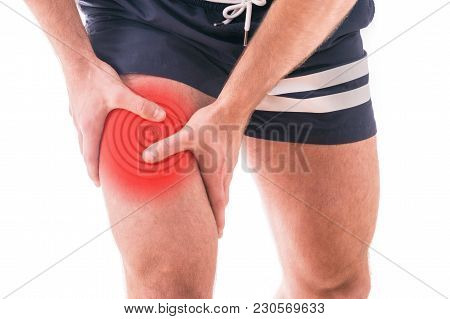 Man With Quadriceps Pain Over White Background