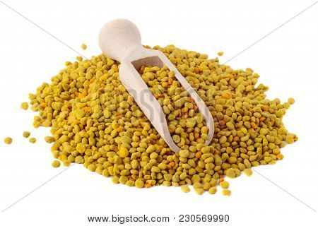 Flower Bee Pollen And A Wooden Slove Is Isolated On A White Background. Natural Remedy For Immunity 
