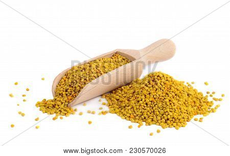 Flower Bee Pollen And A Wooden Slove Is Isolated On A White Background. Natural Remedy For Immunity 