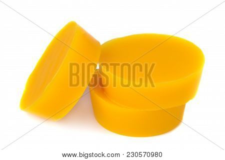 Pieces Of Natural Beeswax Are Isolated On A White Background. Beekeeping Products. Apitherapy