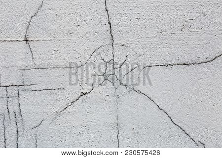 Texture Of White Dirty Cracked Wall. Small Straight Cracks. Direct Fracture On Painted Surface. Cell