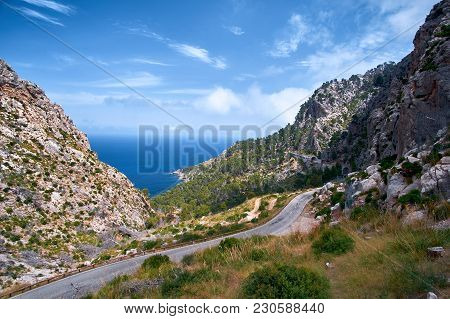Beautiful Picturesque Winding Road Of Spain Summer Coast And Mediterranean Sea With Tunnel.