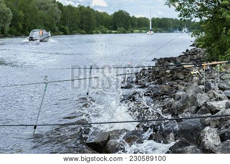 Summer Landscape With Fishing Rods On The Background Of Lake, Opposite Shore, Morning, Yacht, Beach 