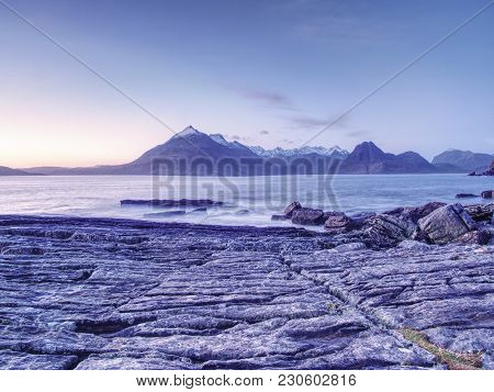 Evening At Loch Scavaig With Cuillins Mountains In Warm Sunset Light.  Isle Of Skye Scotland