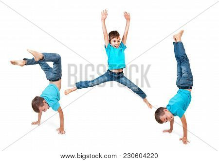 Young Boy Doing Handstand With A White Background