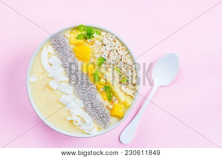 Mango, Banana, Pineapple And Oatmeal Smoothie In The Bowl