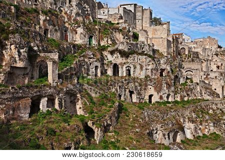 Matera, Basilicata, Italy: Landscape At Sunrise Of The Old Town Called Sassi Di Matera With The Hous