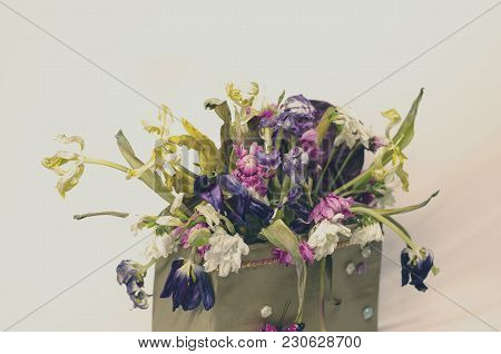 Withered Vintage Flowers Bouquet In A Box On White Background